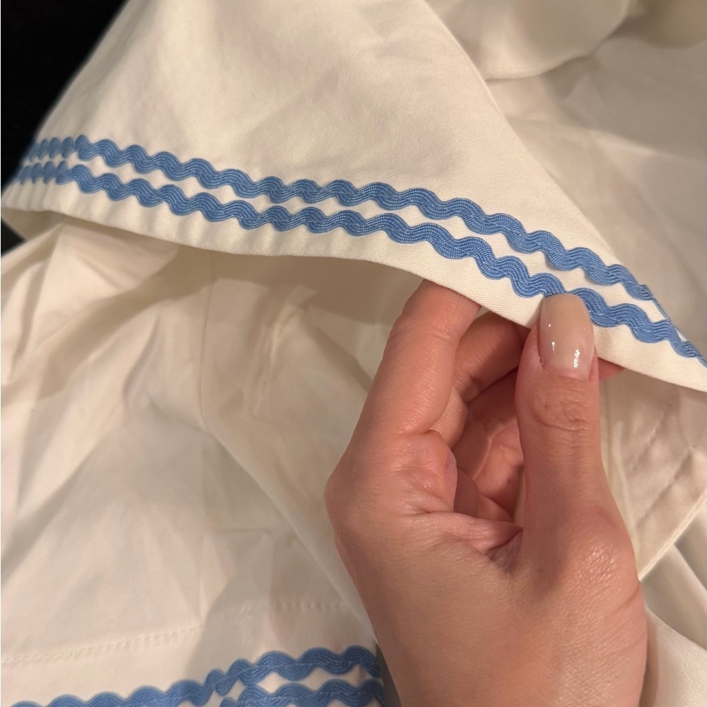 Elegant White Blouse with Blue Trim - Picture 3 of 3